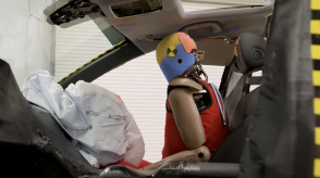 A still image from a video showing a crash-test model is shown. 